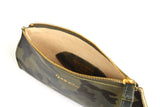 [Camo/Palomino] wristlet open view showing blonde suede interior lining and gold zipper.