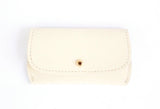 [Magnolia Cream] Pretty Pocket front view with gold button closure
