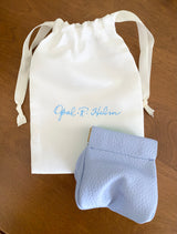 Bauble Bag shown with suede drawstring dust bag with Opal .R. Helm logo