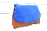 [Electric Bluebonnet Suede/Saddle Tan] Pommel Clutch angled view
