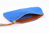 [Electric Bluebonnet Suede/Saddle Tan] Pommel Wristlet open view.