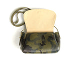 [Camo/Palomino] Crossbody open view showing blonde suede interior lining.