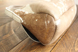 Cowhide Crossbody Saddle Bag side view featuring the Opal .R. Helm gold logo. Shown in color [Cowhide A].