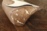 Cowhide Crossbody Saddle Bag side view features the Opal .R. Helm gold logo. Shown in color [Cowhide D].