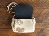 Cowhide Crossbody Saddle Bag open view features the Dark Denim Blue suede interior lining. Shown in color [Cowhide G].