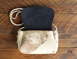 Cowhide Crossbody Saddle Bag open view features the Dark Denim Blue suede interior lining.Shown in color [Cowhide H].