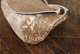 Cowhide Crossbody Saddle Bag side view features the Opal .R. Helm gold logo. Shown in color [Cowhide I].