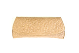 Embossed skull clutch front view.