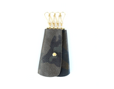 [Camo] retro leather George Key Case with 4 gold key hooks and a gold button for closure.